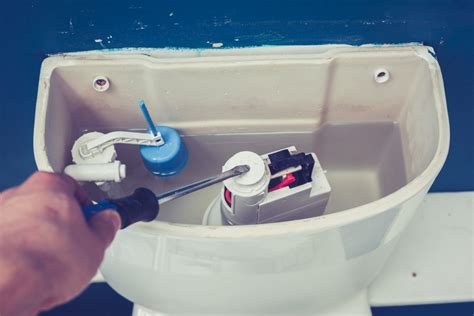 Water leaking from toilet tank into bowl